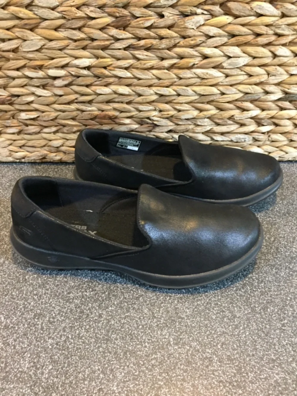 Skechers black slip